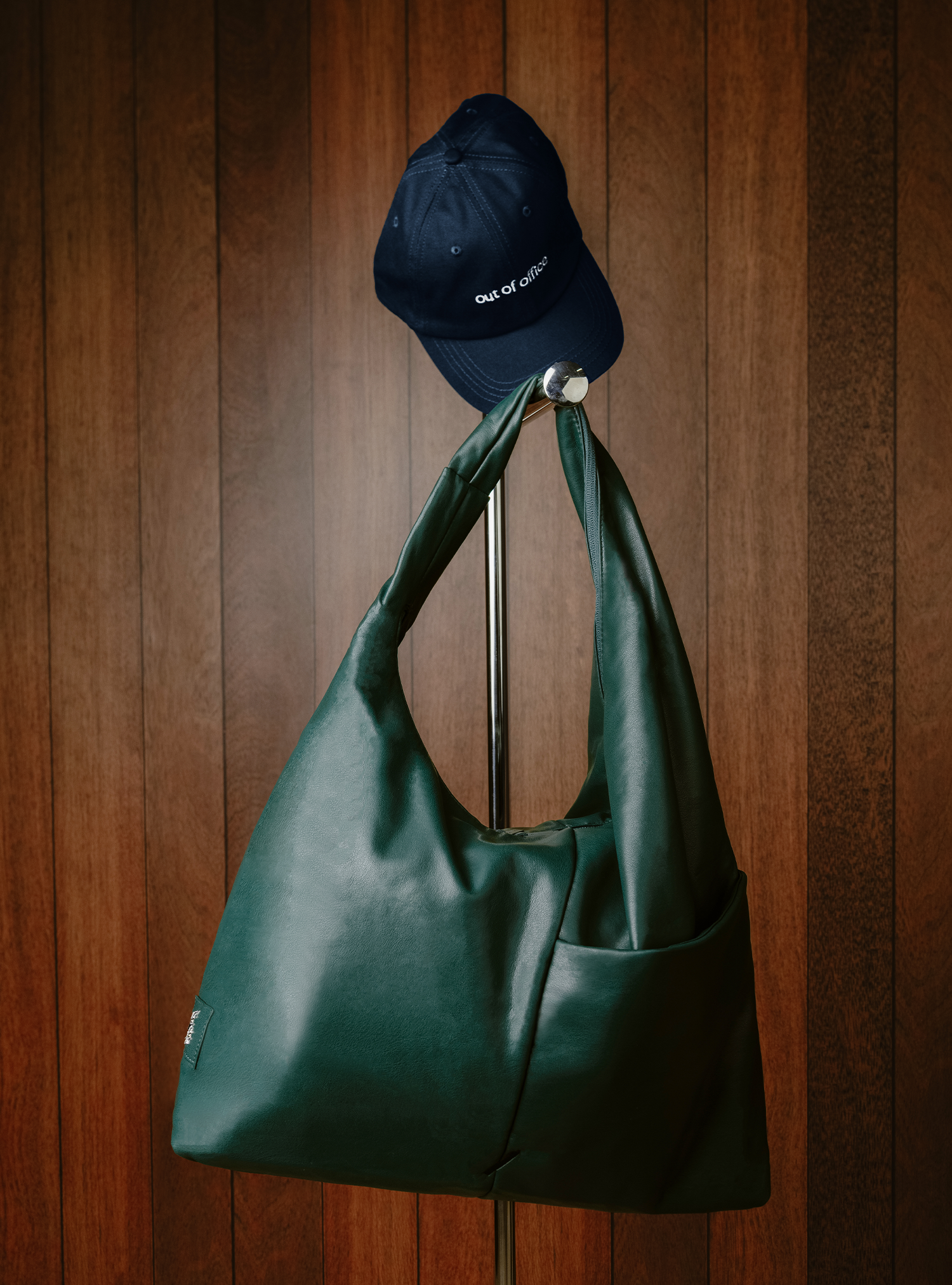 The Arc slouchy hobo-style bag in forest green vegan leather for everyday use
