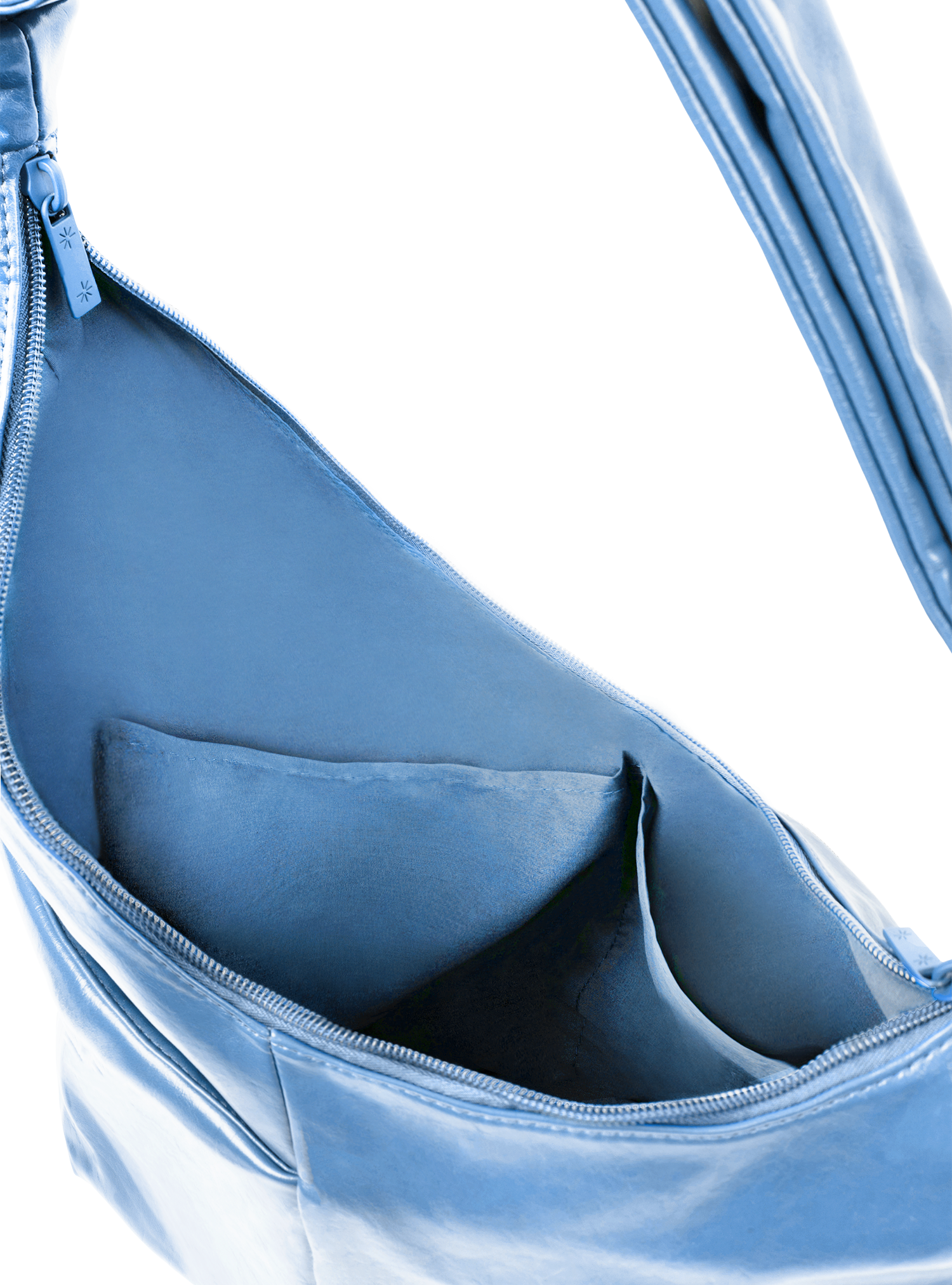 Interior of the Midi Arc hobo-style bag in island blue vegan leather, with multiple pockets