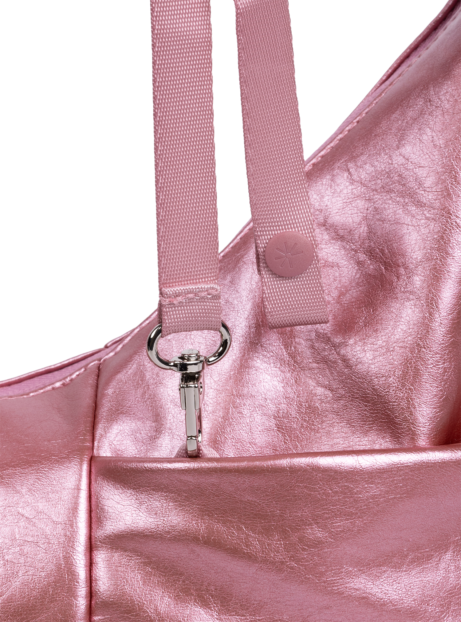 Exterior pocket of the Mini Arc hobo-style shoulder bag in metallic pink vegan leather, with concealed snap loop