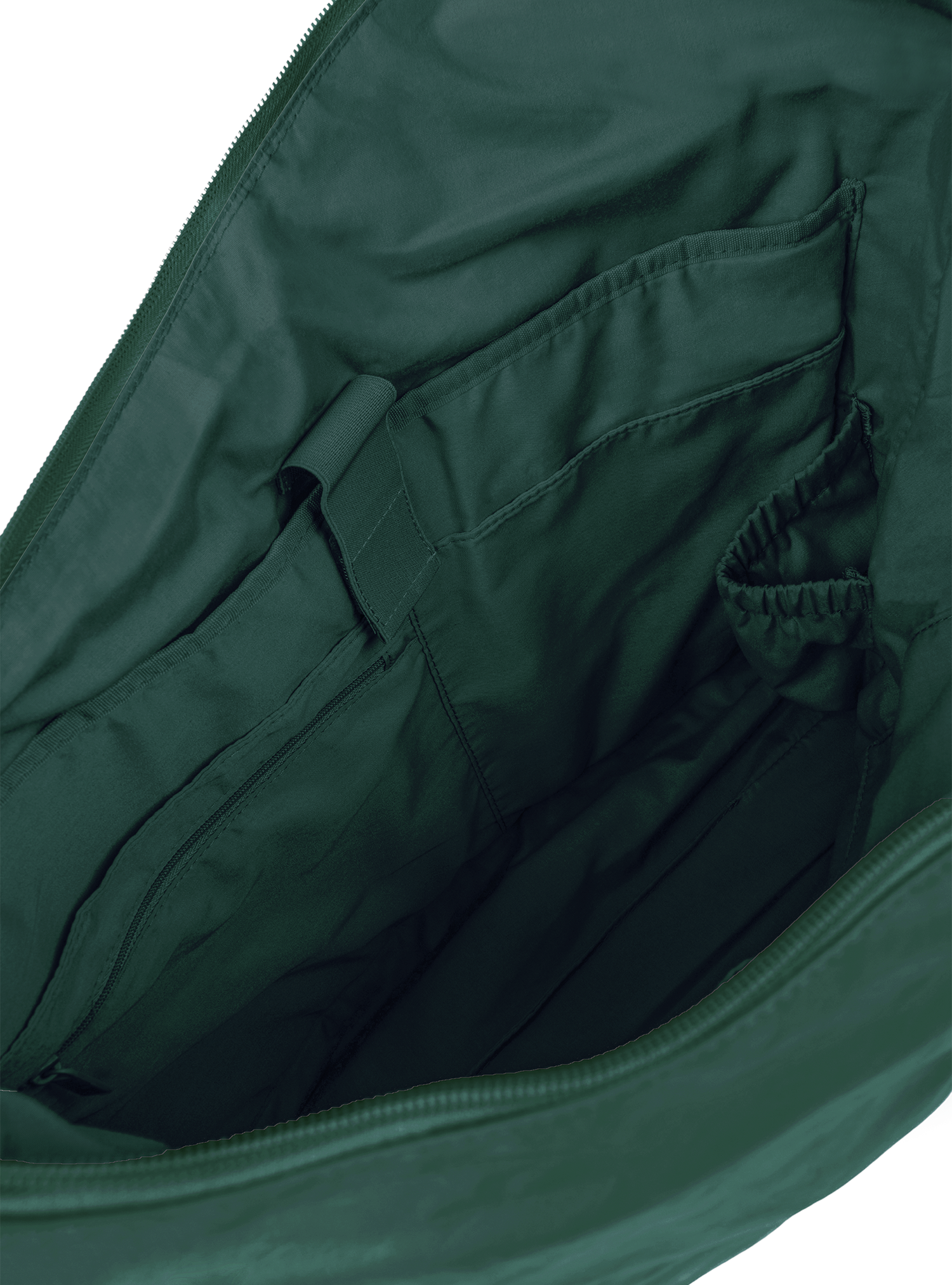 Interior of the Arc hobo-style bag in forest green vegan leather with laptop compartment