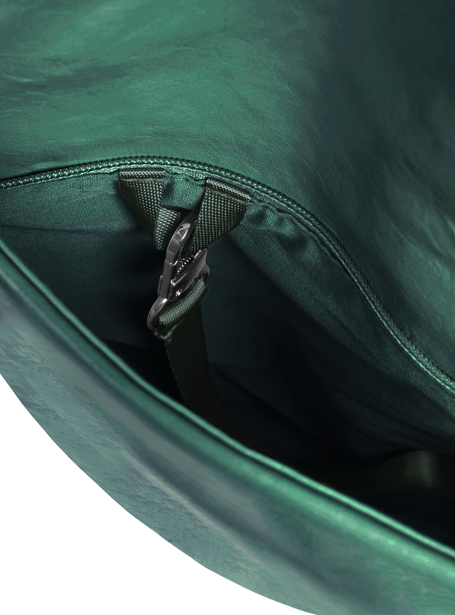 Exterior pocket of the Arc hobo-style bag in forest green vegan leather with concealed snap loop