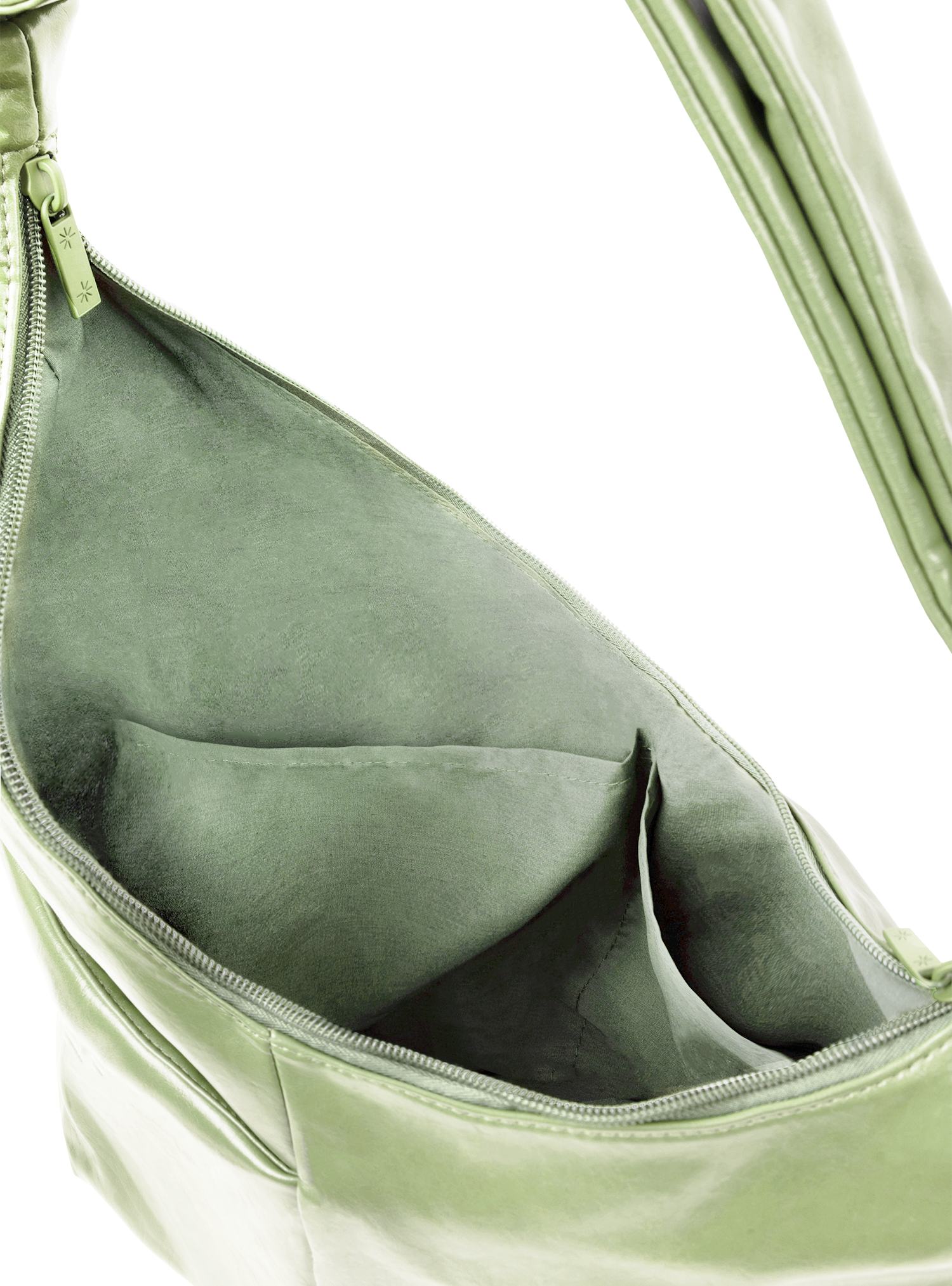 Interior of the Midi Arc hobo-style bag in pastel green vegan leather, with multiple pockets
