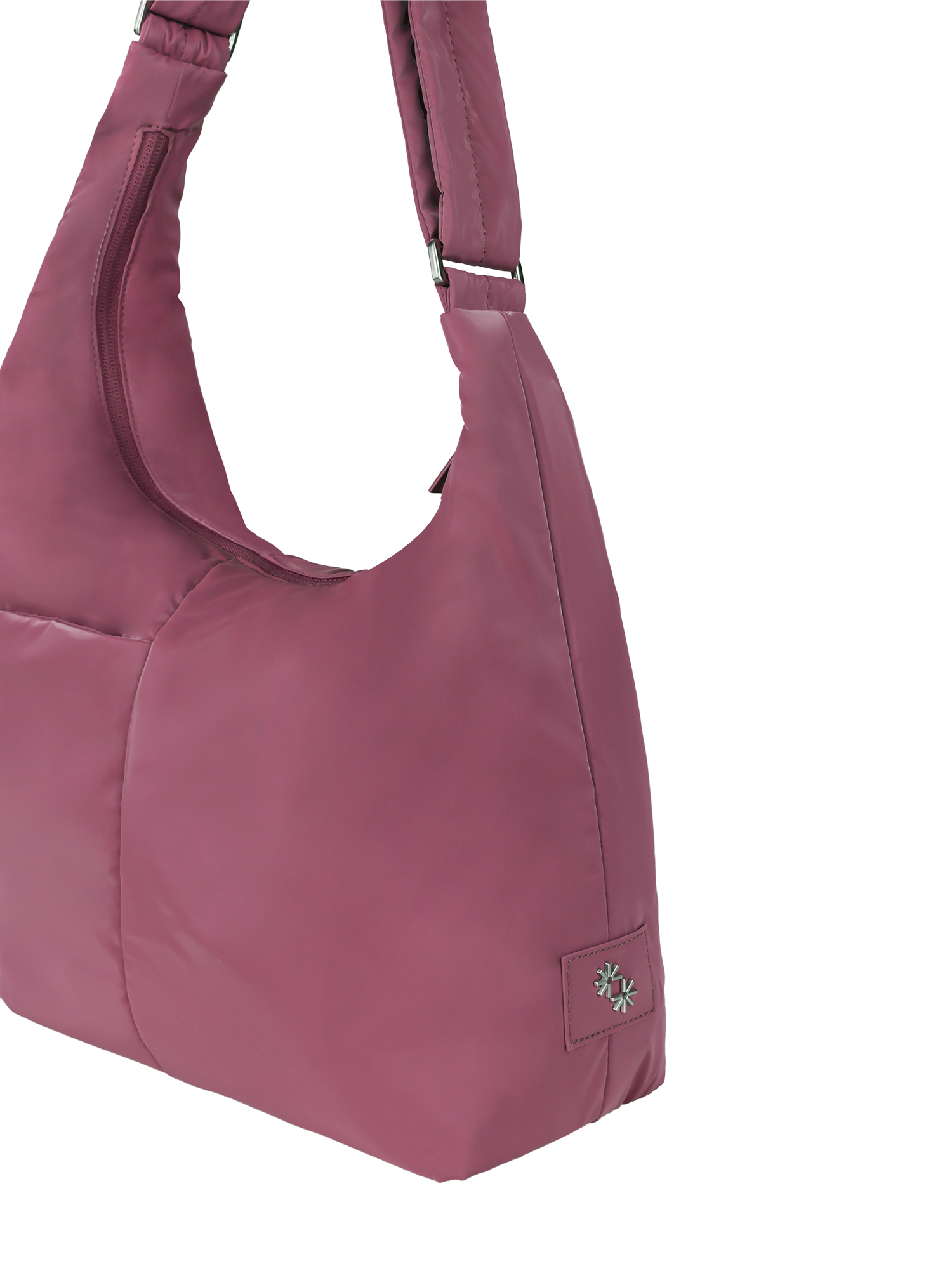 Close-up of the Midi Arc hobo-style bag in rouge pink polyester, showing metal logo emblem