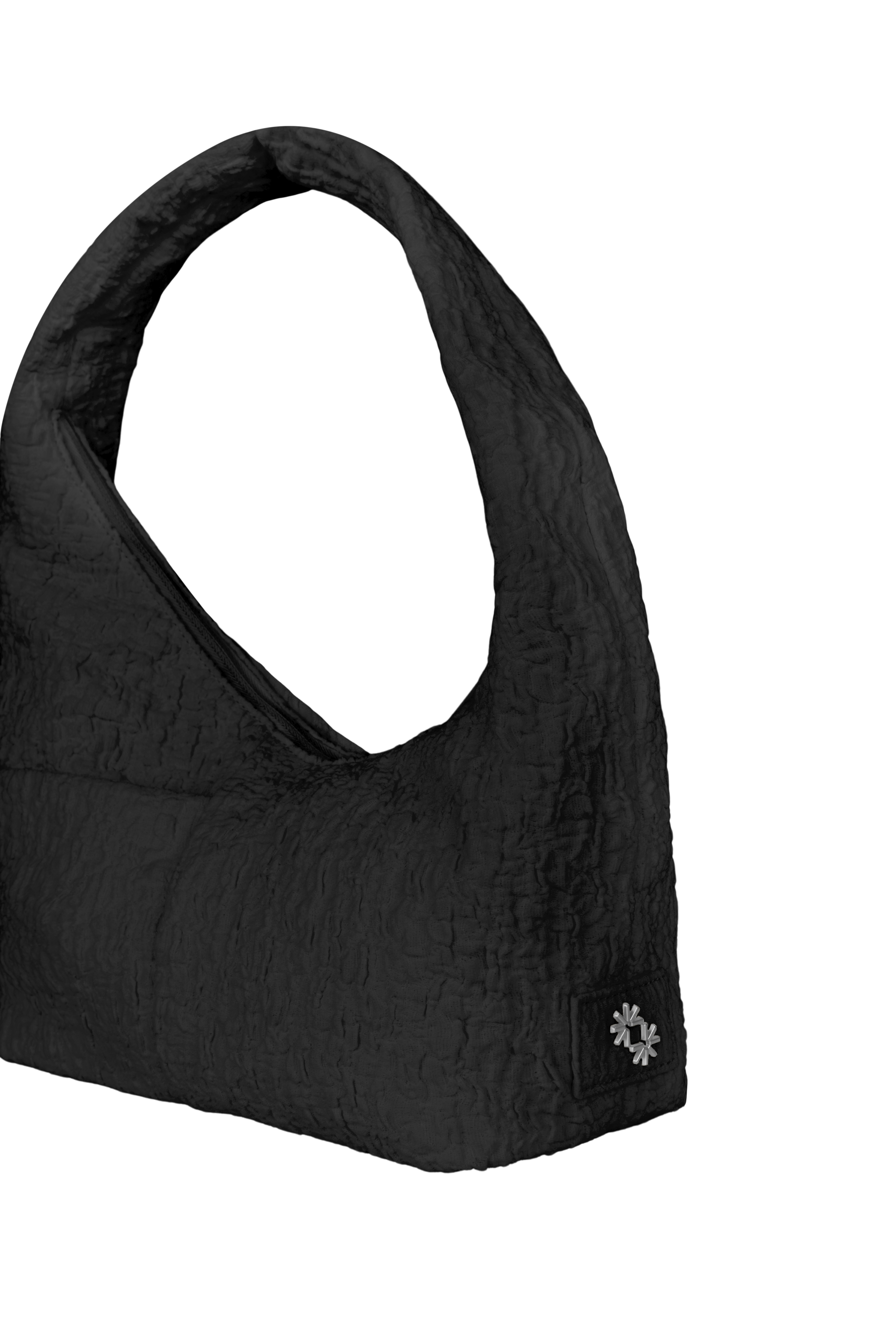 Close-up of the Mini Arc hobo-style shoulder bag in black polyester-cotton blend, showing metal logo emblem