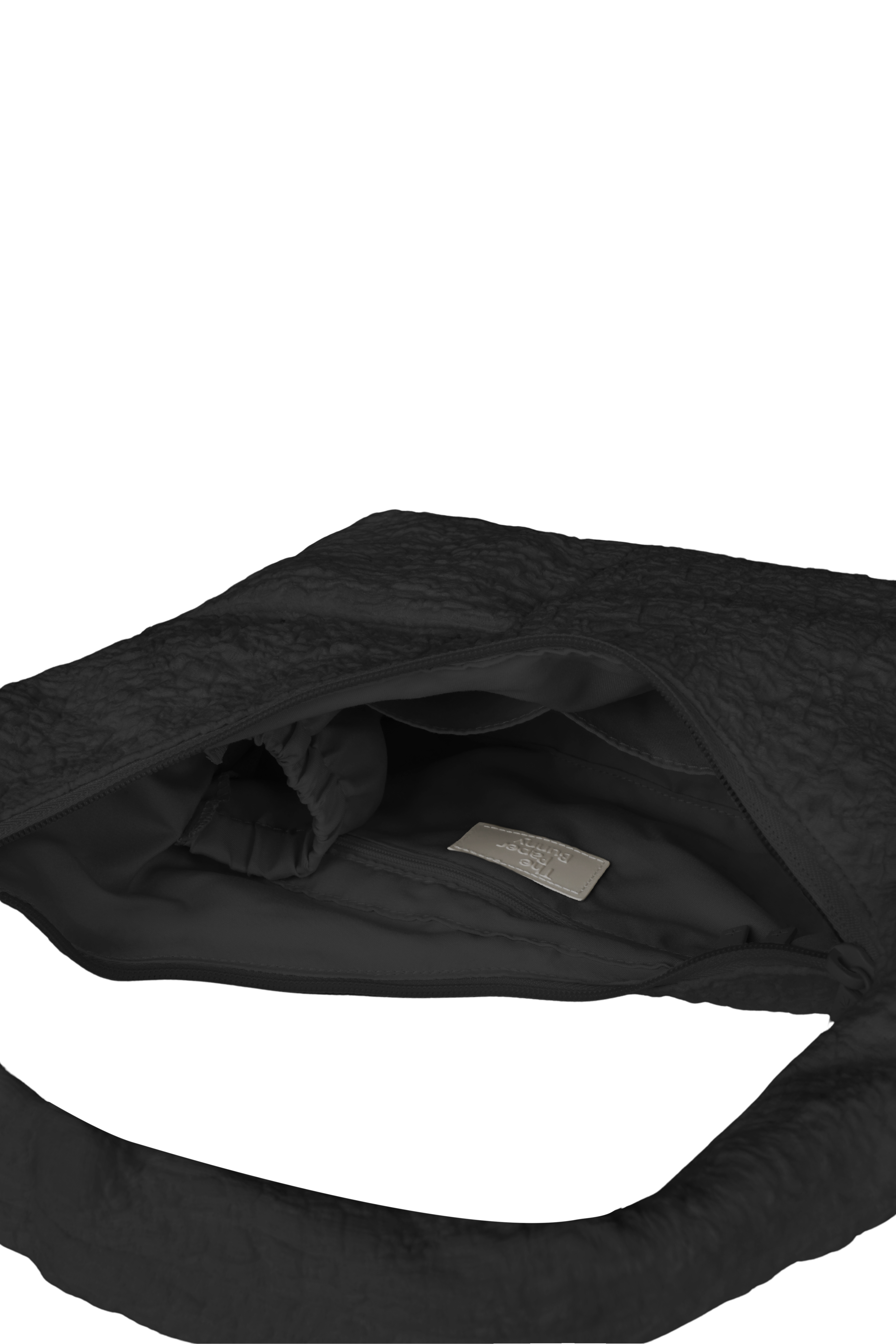 Interior of the Mini Arc hobo-style shoulder bag in black polyester-cotton blend, with multiple pockets and a bottle holder