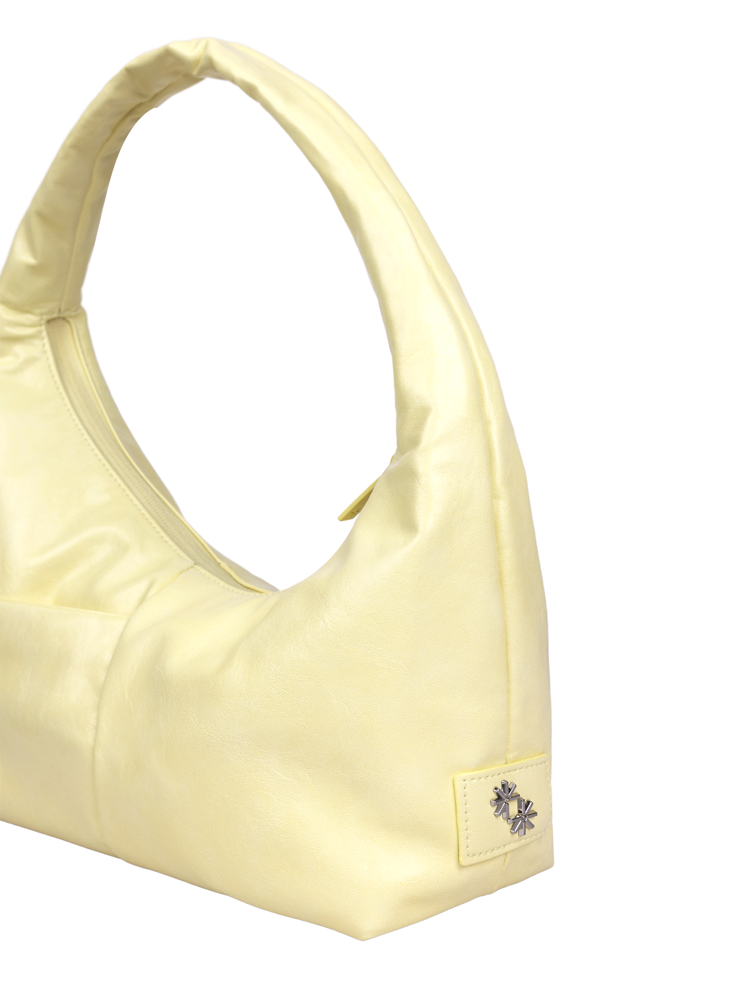 The Mini Arc slouchy hobo-style shoulder bag in creamy yellow vegan leather with exterior pockets