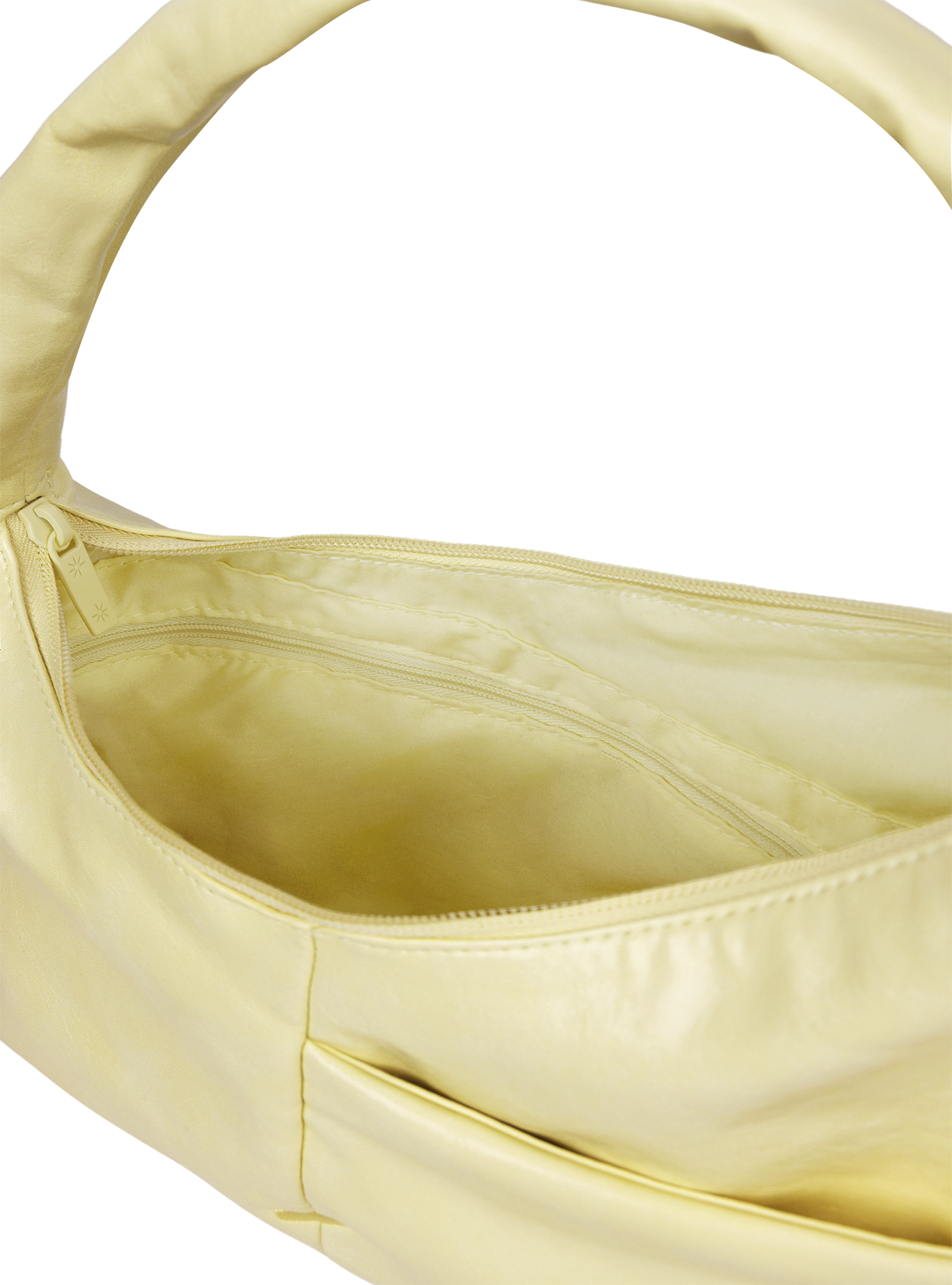 Interior of the Mini Arc hobo-style shoulder bag in creamy yellow vegan leather, with zipped interior pocket